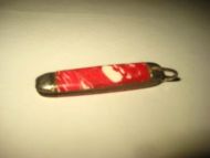 Liten lommekniv ca 2 cm lang