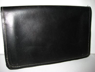 Meget pen og ubrukt lommebok fra 60 tallet.