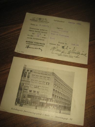 Kvitering på betalt polise i NORSKE FORENDE LIVSFORSIKRINGSSELSKAP med bilde av selskapets forretningsgård på baksida Januar 1950