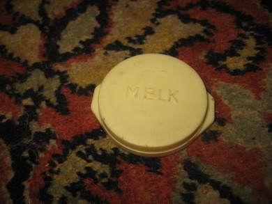 Lokk til gammel melkeflaske fra 60 tallet