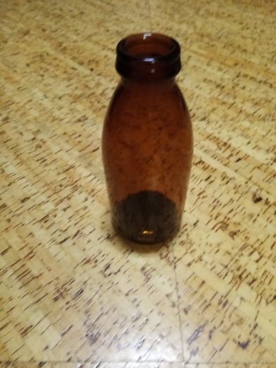 Melkeflaske fra 60 tallet brun lita flaske