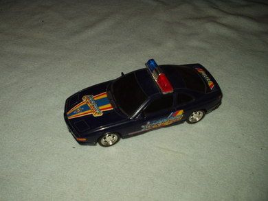 Mekanisk politibil 25 cm lang