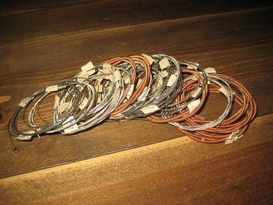 Pakke med gitarstrenger ?? en masse med nummerering Selges under ett