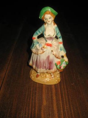 Porselensfigur ca 14 cm høg 60 tallet