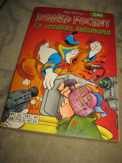 2001 NR 244 EN VERDENS TALSMANN