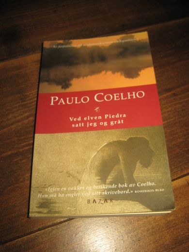 COELHO PAULO: VED ELVEN PIEDRA SATT JEG OG GRÅT 2004