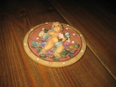 Noe for deg klart til å henge opp Ca 10 cm i diameter